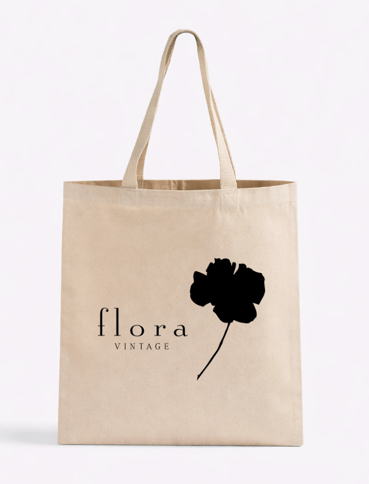 Reusable wholesale canvas shopping bag with reinforced handles and custom branding